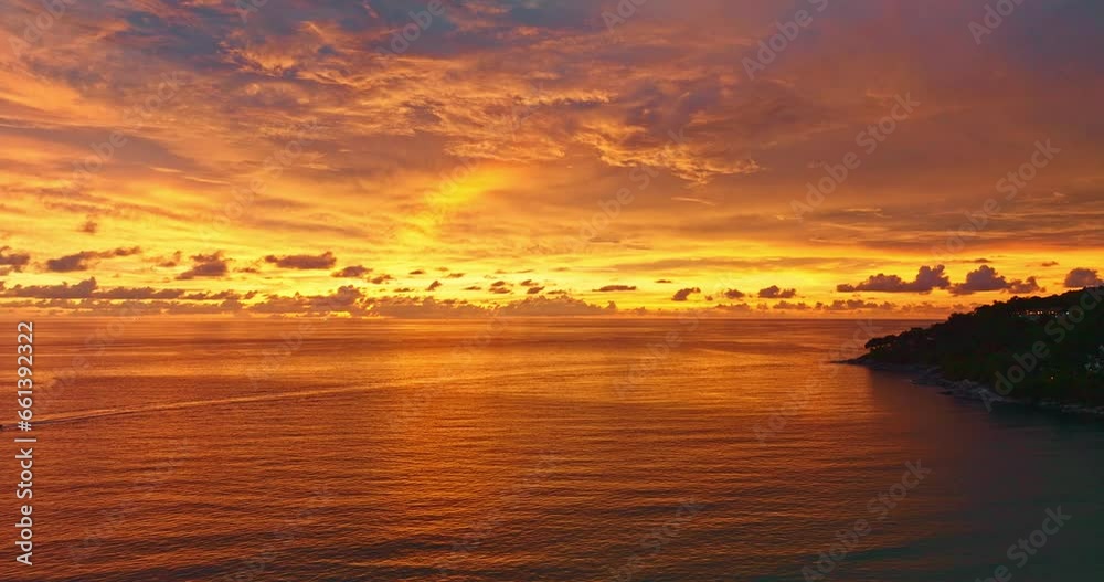 .Aerial view orange clouds are moving slowly in the sky during sunset..Scene of Colorful romantic sky sunset with cloud. sky texture..reflection Gradient gold color. Sky texture background. .Aerial view orange clouds are moving slowly in the sky during sunset..Scene of Colorful romantic sky sunset with cloud. sky texture..reflection Gradient gold color. Sky texture background.
