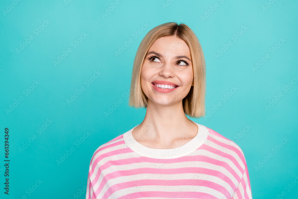 Fototapeta premium Photo of dreamy thoughtful lady wear pink pullover looking empty space isolated turquoise color background