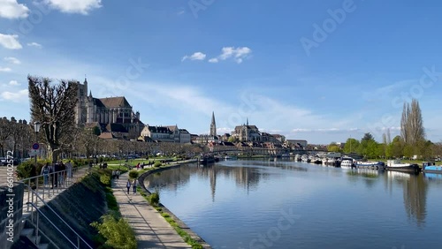 Panoramic video of the city of Auxerre on a bright sunny day with the river and the Saint-Etienne d'Auxerre Cathedral in the background photo