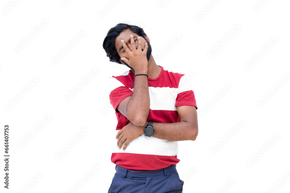 a man in a red and white shirt is covering his face with his hands and is looking up at the sky a man in a red and white shirt is covering his face with his hands and is looking up at the sky