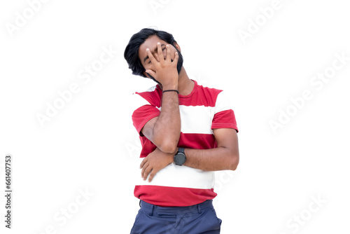 a man in a red and white shirt is covering his face with his hands and is looking up at the sky © Graphic Dude