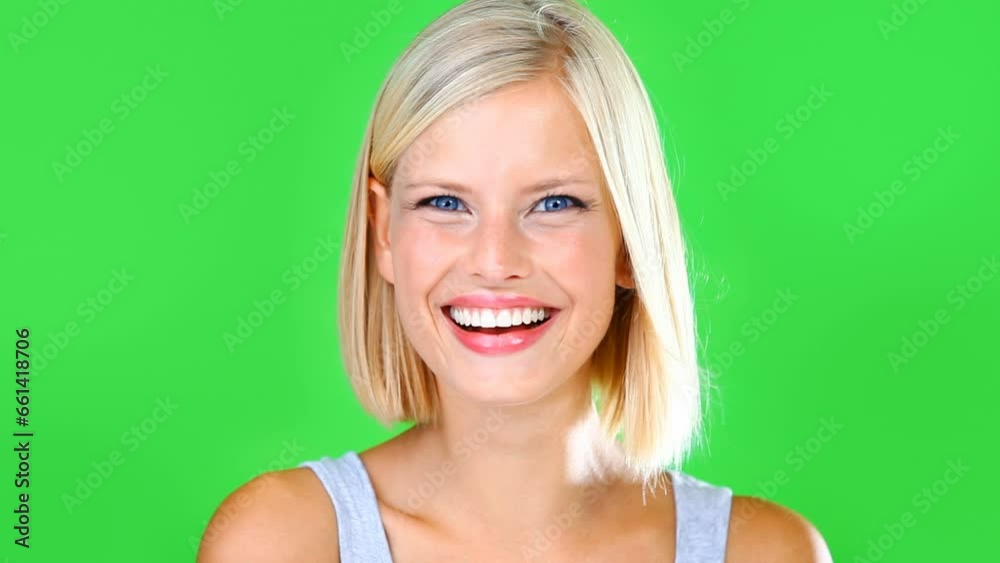 Green screen, fist knocking and woman wink in studio isolated on a background. Hand of person tapping on door, blink gesture and call, communication or sign to welcome guest in home in portrait