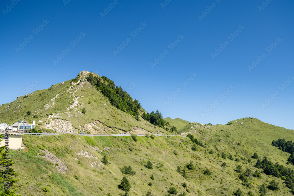 Mountain hike trailing path over the forest