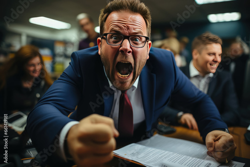 Business man shouts in the office , Angry man shouting into his smartphone