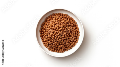 dry pet food in bowl on white background top view