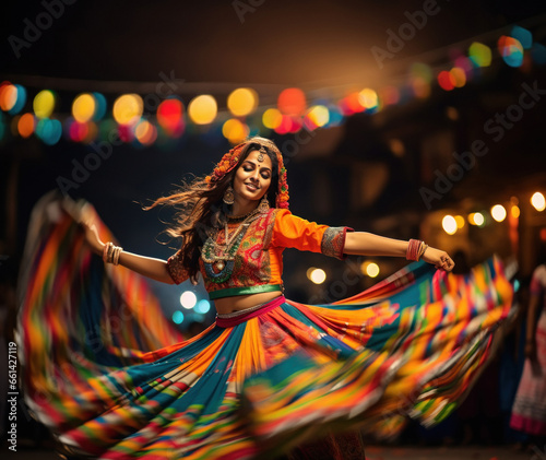 Indian woman Performing garba dance. Garba dance is performed in Navratri festival. photo