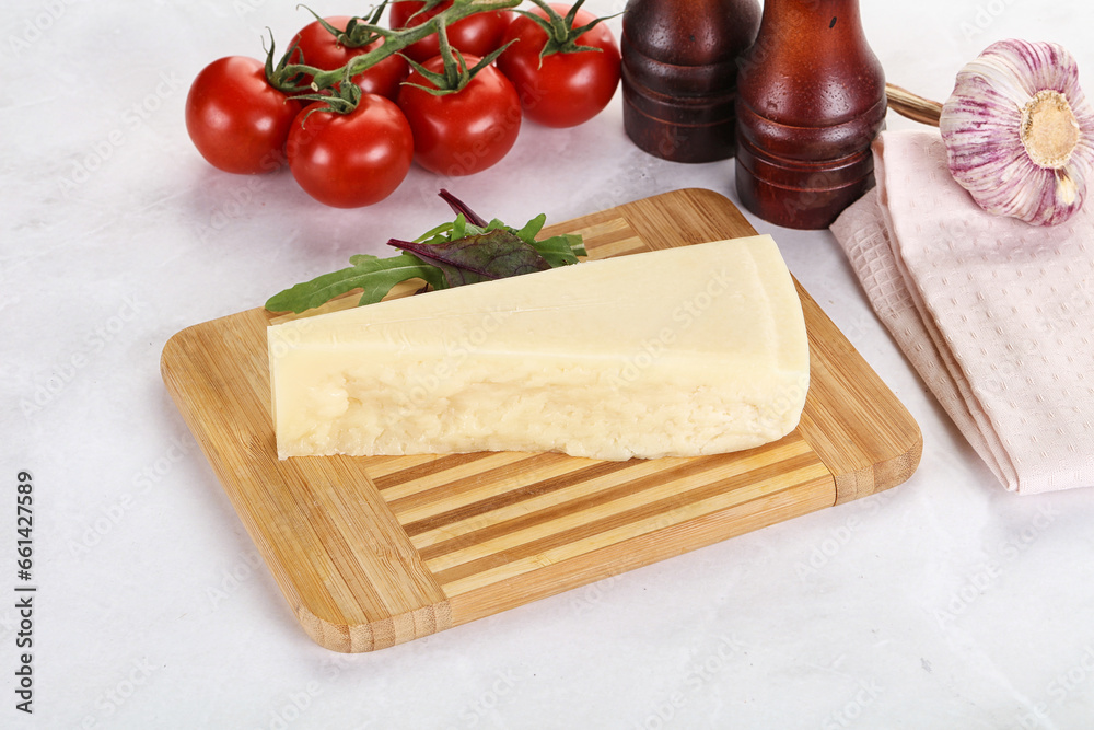 Piece Italian hard parmesan cheese Piece Italian hard parmesan cheese