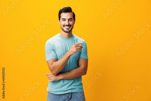 Fashion man space portrait background trendy copy confident lifestyle laughing yellow smiling style arm studio gesture