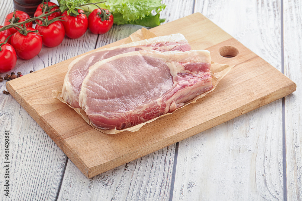 Raw pork t-bone steak for grill Raw pork t-bone steak for grill