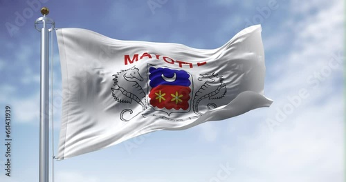 Flag of Mayotte waving in the wind on a clear day photo