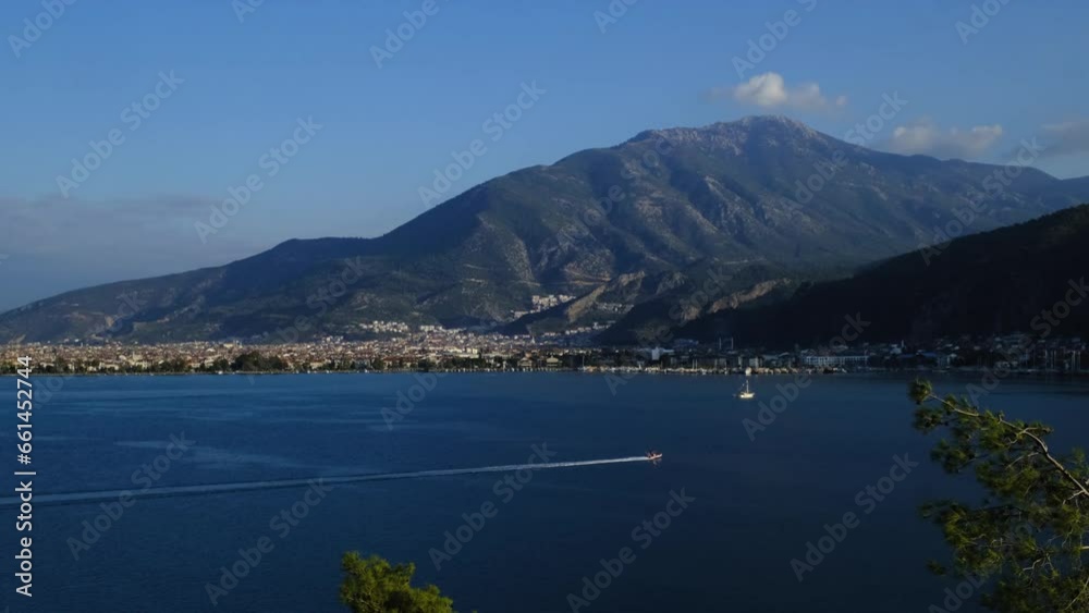Turkey, trip to Fethiye, Mugla Province. view from the peninsula to the city and the marina Turkey, trip to Fethiye, Mugla Province. view from the peninsula to the city and the marina