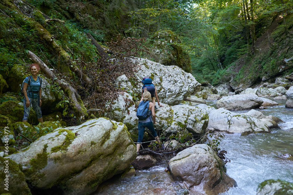 Woman hikers exploring a gorge