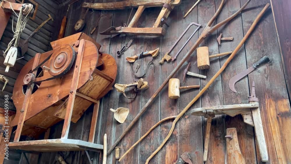 Video of a bunch of farming tools on a wooden wall in Switzerland Video of a bunch of farming tools on a wooden wall in Switzerland