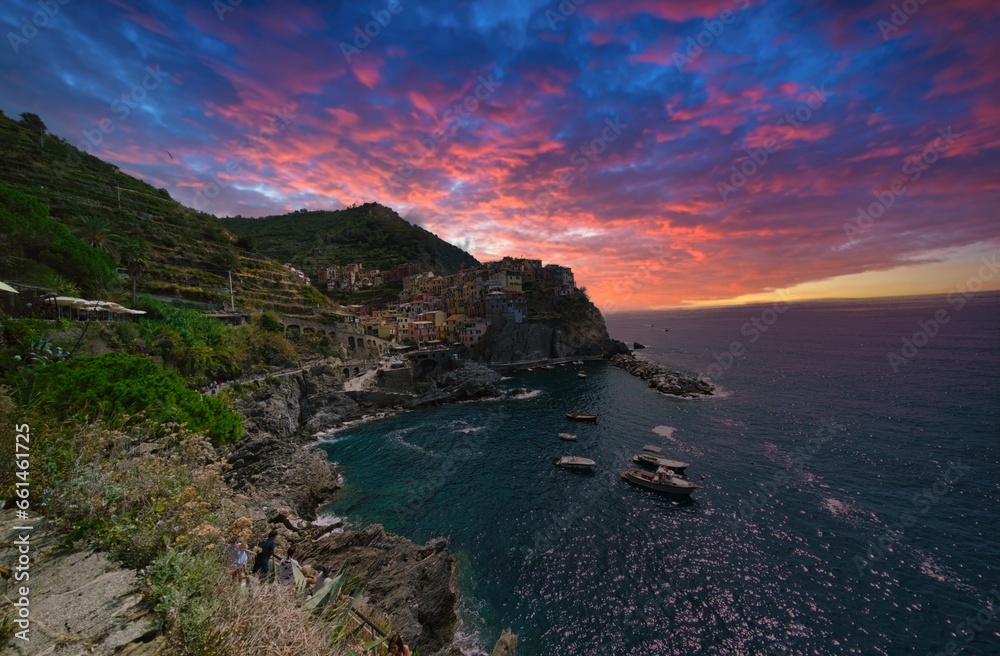 Beautiful sunset in  Manarola a popular fishing village and a  tourist destination in Cinque Terre in Italy