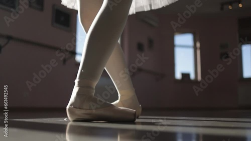 Dancing ballerina, dancer's feet, ballet elements, pirouette photo