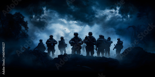Army soldiers with his guns on a dark background