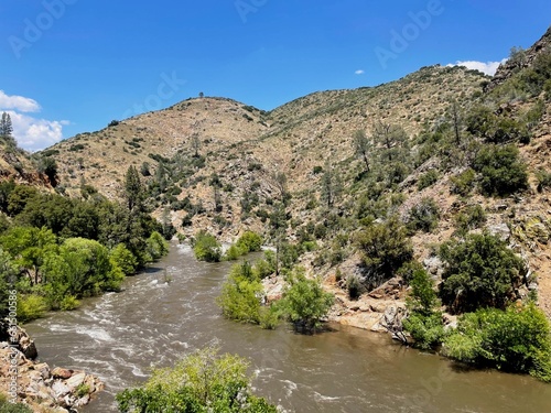 View of the river and mountains in the background in Johnsondale. It is an unincorporated community in Tulare County, California, United States. Johnsondale is 20 miles away. northeast of California. photo