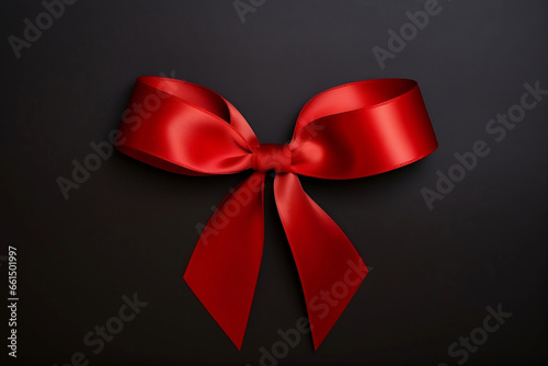 red bow on black background, Red Ribbon Resilience: A Close-Up Tribute to the Universal Symbol of HIV/AIDS Awareness and Support. World AIDS Day