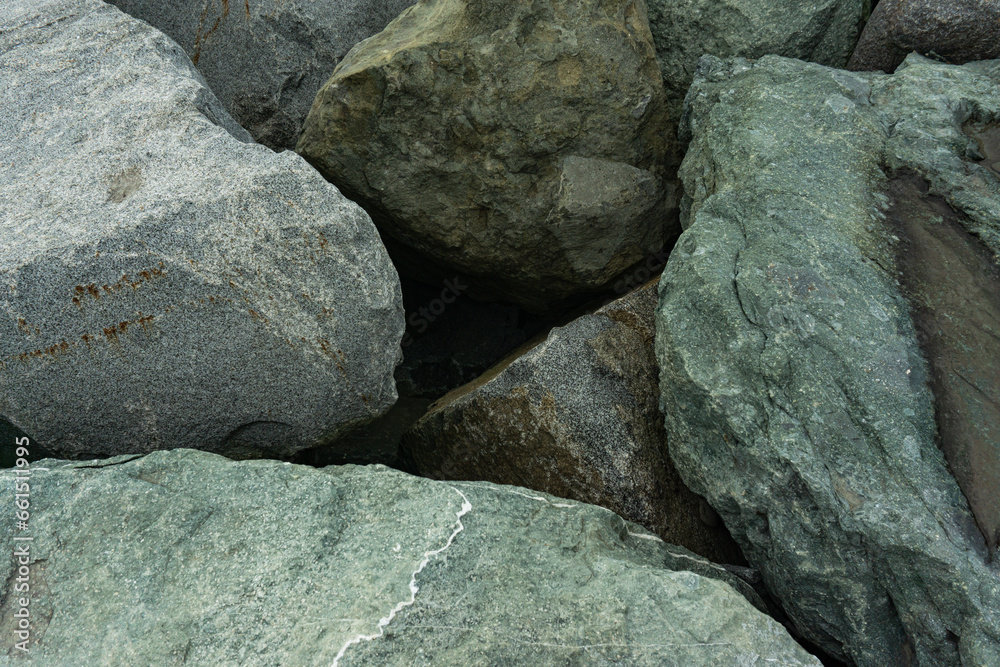 Background of Textured Beach Stones Evoking a Calm Atmosphere
