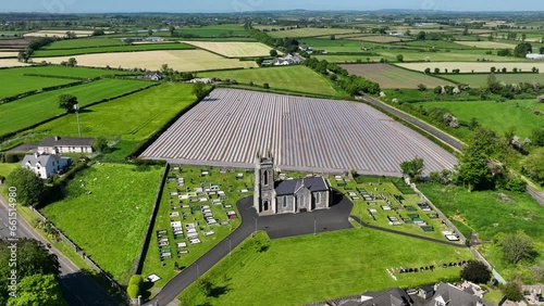 Aerial video of Church of Ireland Dervock Anglican Church on the North Coast of Co Antrim Northern Ireland photo