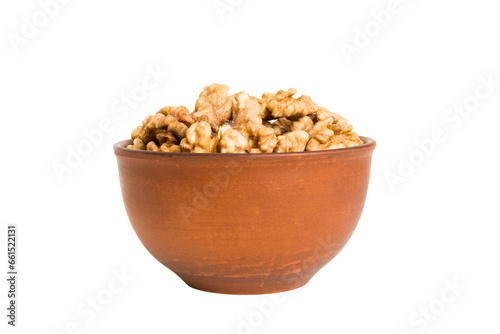 Roasted walnuts in bowl isolated on white background. walnuts is snack or raw of cook. Healthy food concept