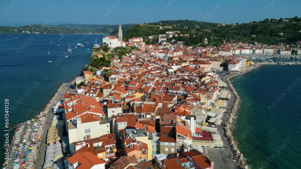 Charm of the ancient cities of Europe. Bright morning cityscape of Piran town. Stunning summer scene of Slovenia's Adriatic coast with beautiful Venetian architecture. Aerial view from drone Charm of the ancient cities of Europe. Bright morning cityscape of Piran town. Stunning summer scene of Slovenia's Adriatic coast with beautiful Venetian architecture. Aerial view from drone
