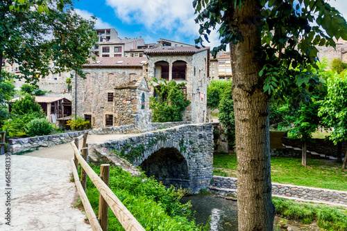 Bagà is a town in the Berguedà region. Historically it belonged to the Barony of Pinós and is the historical capital of the Alt Berguedà. Spain. Pinós bridge, medieval style, church of Sant Esteve. photo