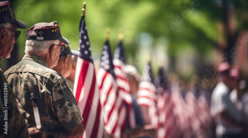 A group of veterans saluting the flag during a Memorial Day parade, with copy space, blurred background