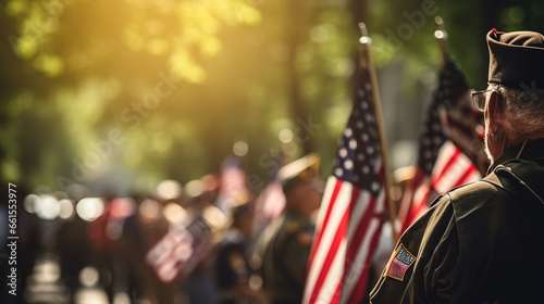 A group of veterans saluting the flag during a Memorial Day parade, with copy space, blurred background photo