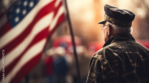 A veteran saluting the American flag during the national anthem, blurred background