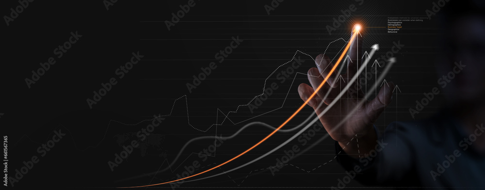 Businessman analyzing company financial balance sheet working with digital virtual graphics ghaph chart. Businessman calculating financial data for long term investment growth goals,