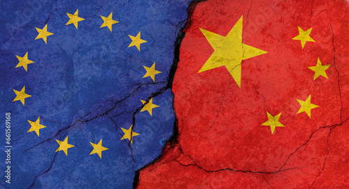 Photos EU and Chinese flags, concrete wall texture with cracks, grunge background, mili