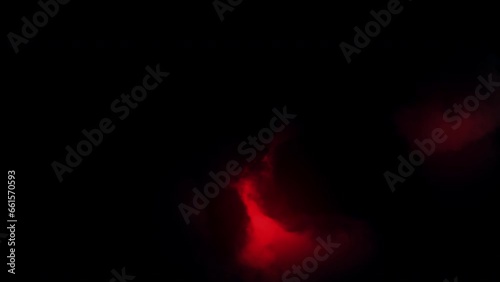 Dramatic Storm Clouds with Red Thunder Lights. Spooky Dark Clouds with Red Strobe Thunderstorm.