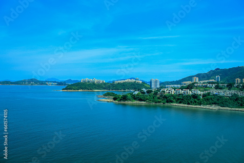 The view of Hong Kong rural scene with calm seascape at sunny day. Travel and nature scene.