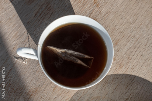 cup of tea on wooden table