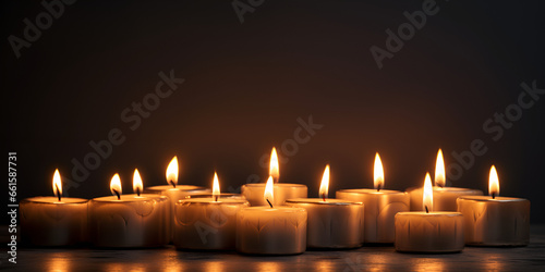 Candle flame isolated on black, advent candles, tea candles on a black background, generative AI