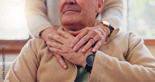 Hands, empathy and a senior couple closeup in their home for love, support or trust during retirement. Hope, healing and sympathy with elderly people on a sofa in the living room of their home