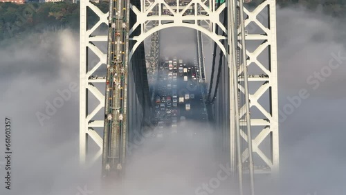 Rush Hour Traffic crossing New York's George Washington Bridge on a foggy autumn morning