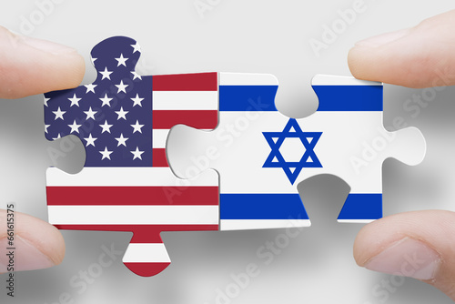 Puzzle made from flags of USA and Israil. United States of America suport Israil photo