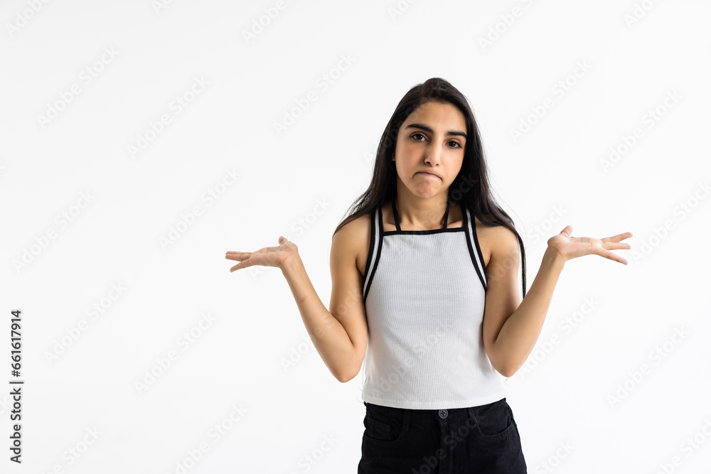 Emotional surprised woman balance sign isolated on white background. Emotional surprised woman balance sign isolated on white background.