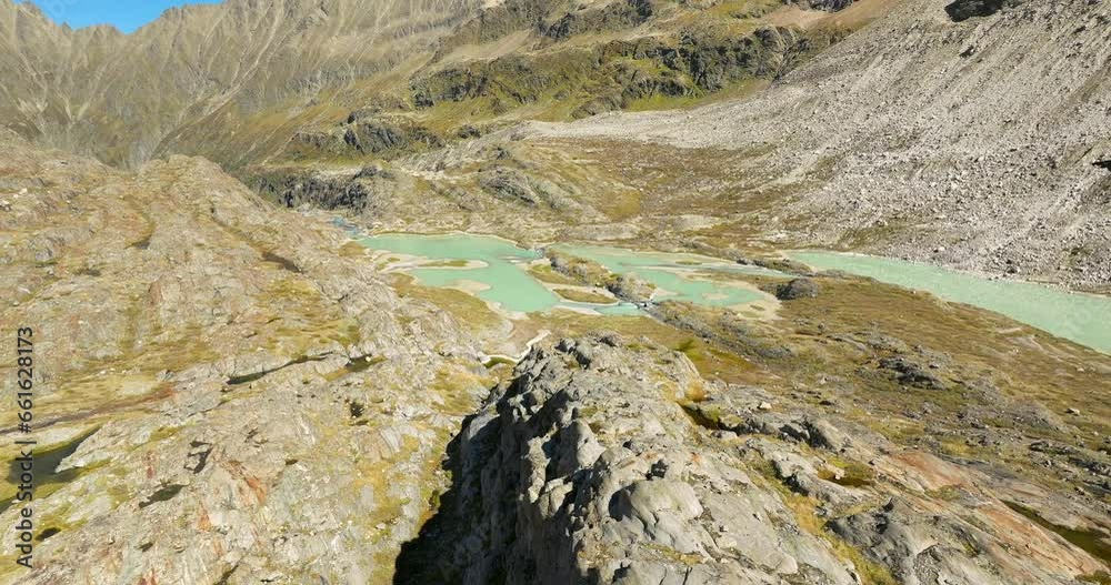 Aerial shoot of melting Gauli glacier in Swiss alps in summer time Switzerland Aerial shoot of melting Gauli glacier in Swiss alps in summer time Switzerland