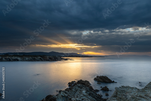 The sunsets in the Ria del Eo  from the Asturian side with the sun setting on Illa Pancha  are spectacular 