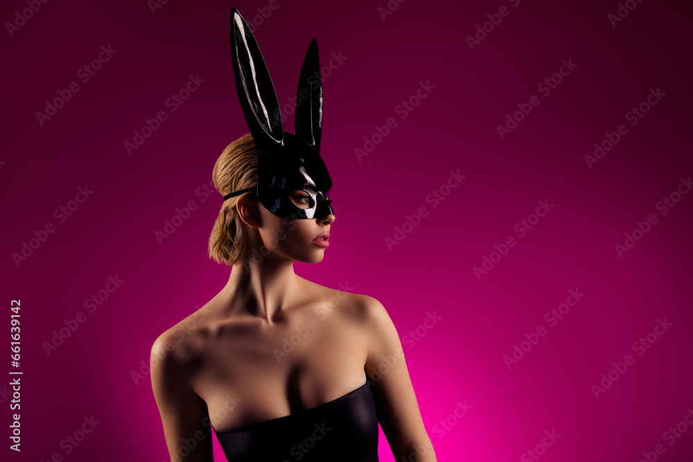 Photo of stunning lady girlfriend look profile side wear leather bunny costume on vivid color background Photo of stunning lady girlfriend look profile side wear leather bunny costume on vivid color background