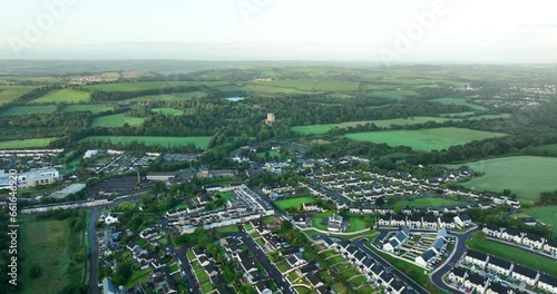 Overhead birds eye view Blarney castle and Blarney castle house Cork Ireland 4k
