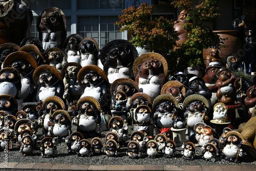 Japan tourism. Famous pottery. Famous pottery Shigaraki Ware. It is famous for its raccoon dog ( Tanuki ) ornaments. Koka city, Shiga prefecture, Japan. photo