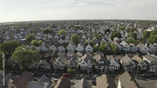 Drone view of Urban Neighborhood with Rows of Family Homes