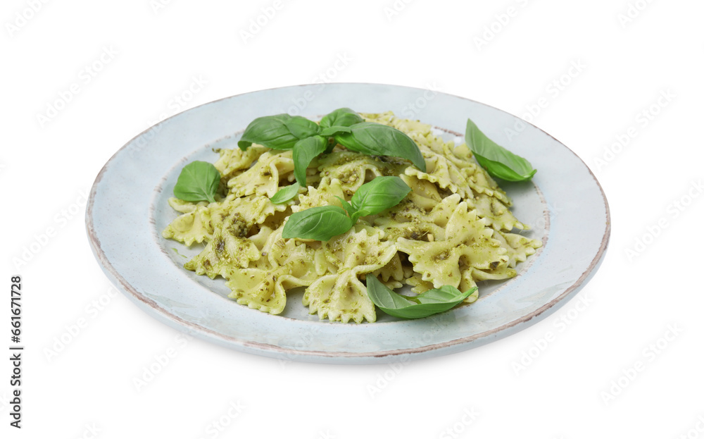 Delicious pasta with pesto sauce and basil isolated on white