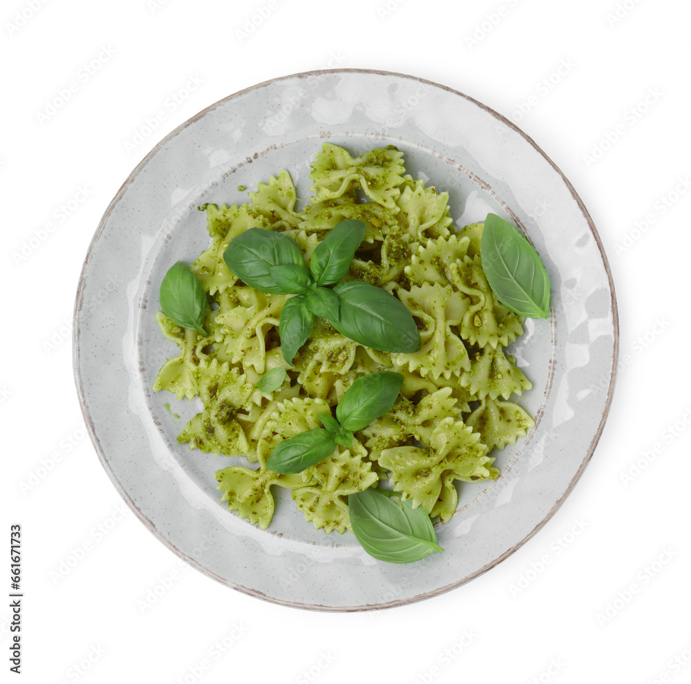 Delicious pasta with pesto sauce and basil isolated on white, top view Delicious pasta with pesto sauce and basil isolated on white, top view