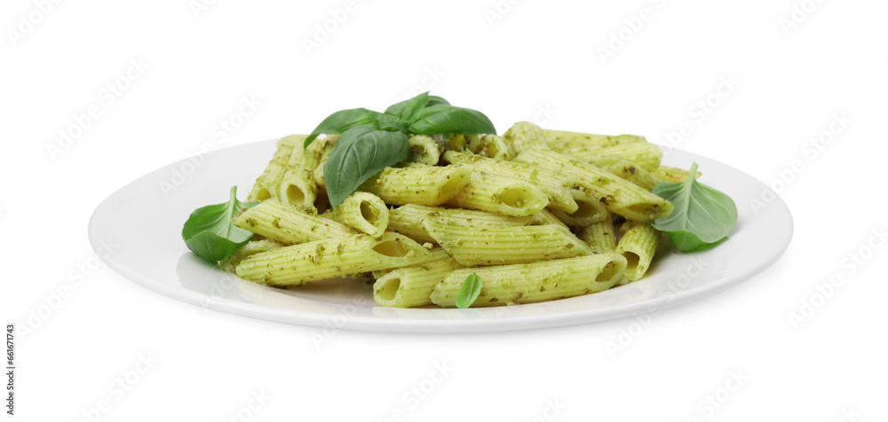 Delicious pasta with pesto sauce and basil isolated on white Delicious pasta with pesto sauce and basil isolated on white