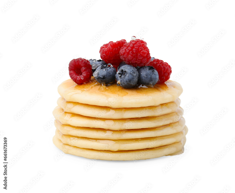 Delicious pancakes with berries and honey isolated on white Delicious pancakes with berries and honey isolated on white